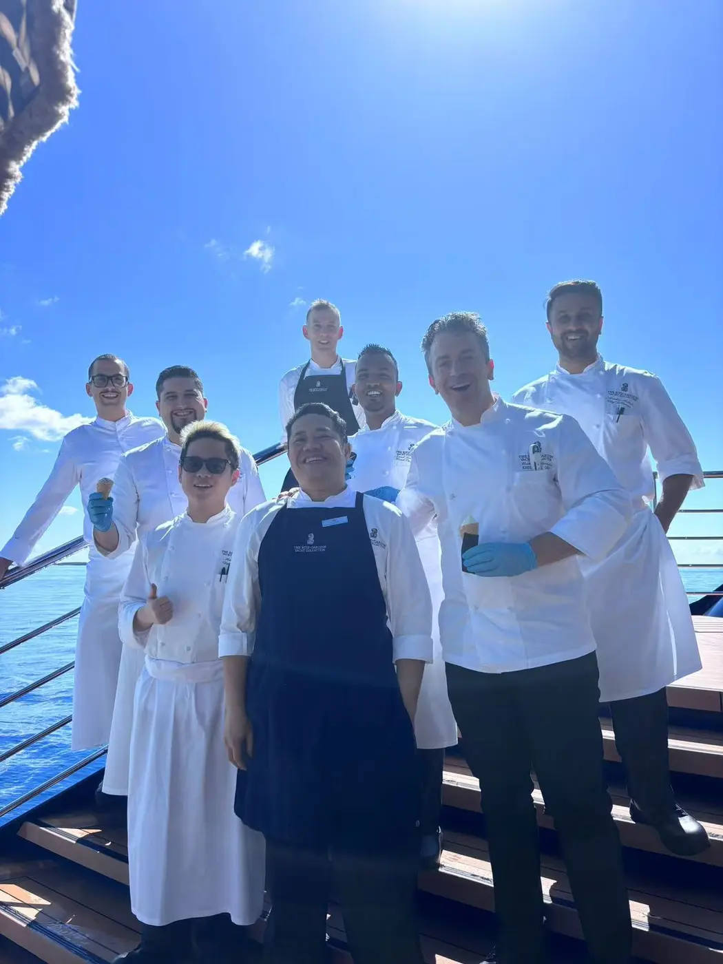 Martin Lum with a culinary team aboard The Ritz-Carlton Yacht Collection